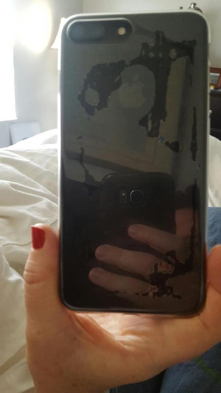 Great case - but show water marks on Jet Black iPhone.