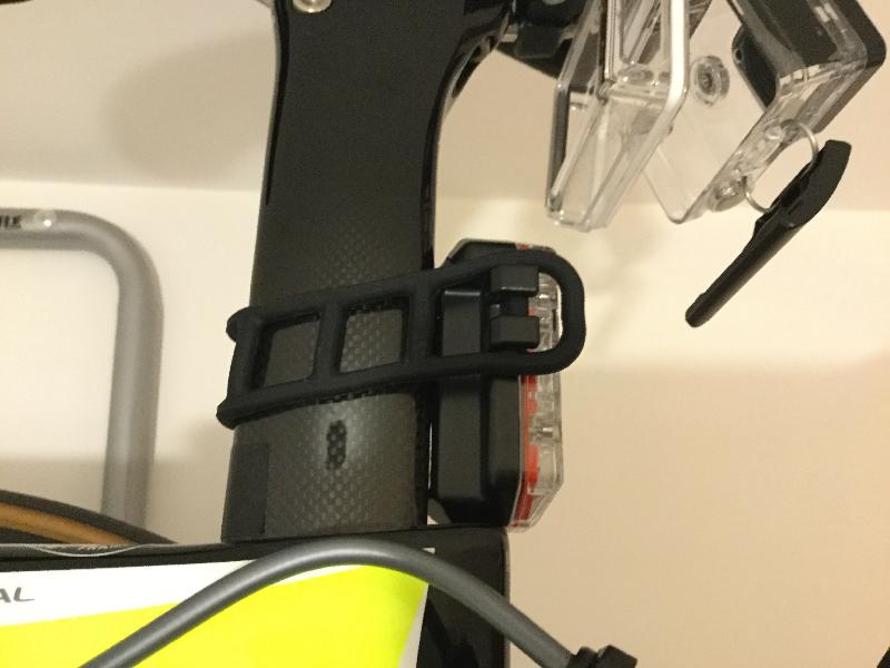 Design flaw to strap firmly against bars and posts.