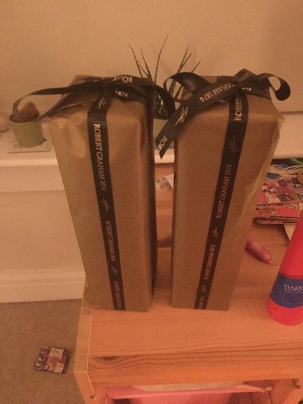 Gift wrapped! No idea what bottle is witch