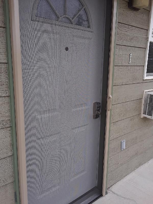 Replacing wind damaged screen doors with Phantom retractable screen doors.