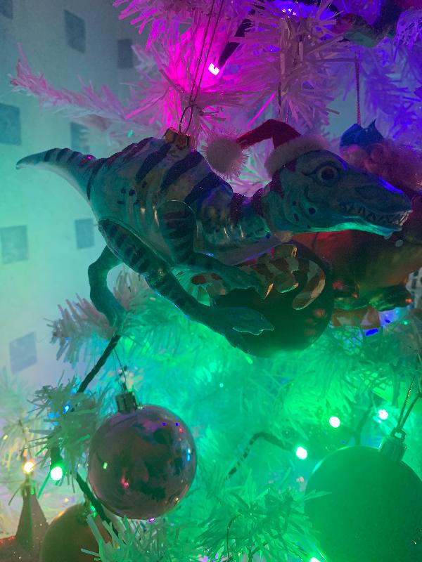 Glass dinosaur with candy cane Christmas tree decoration