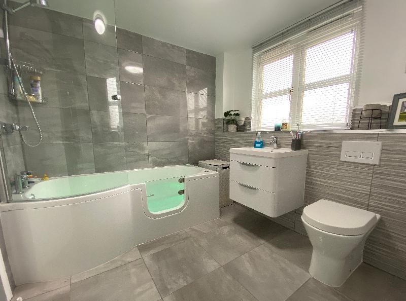 New bathroom with walk in bath