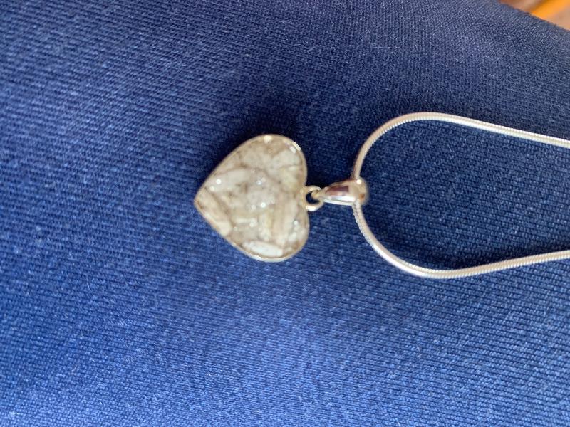 Absolutely brilliant service!!  Beautiful silver resin heart pendants