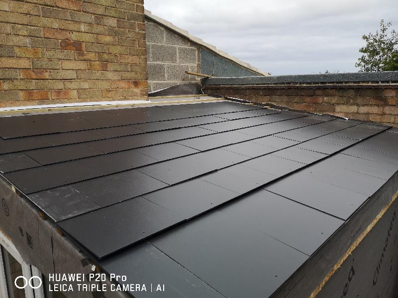 Cement fibre roof tiled