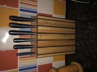 Quality knives and block design for small kitchen surfaces.