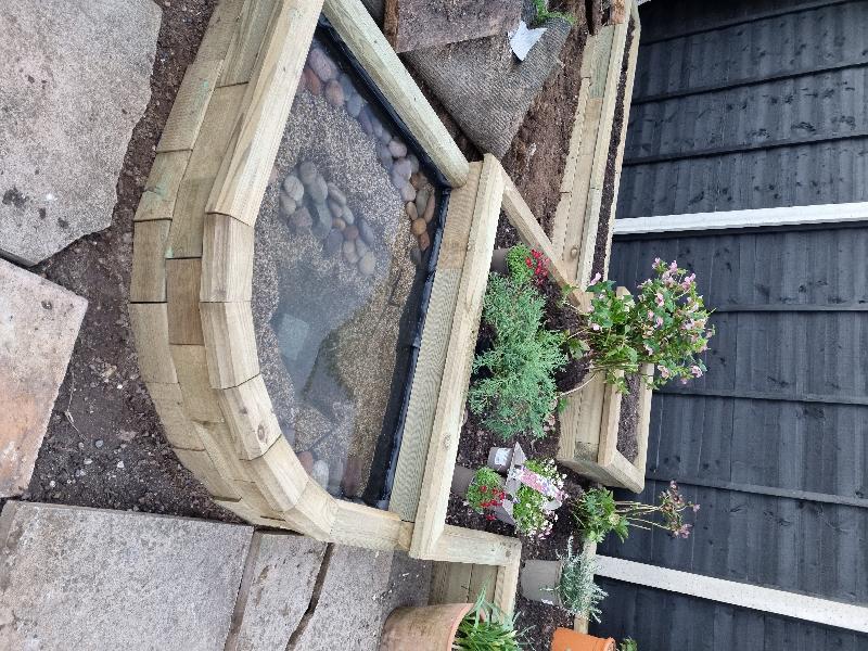 Raised bed with wildlife pond