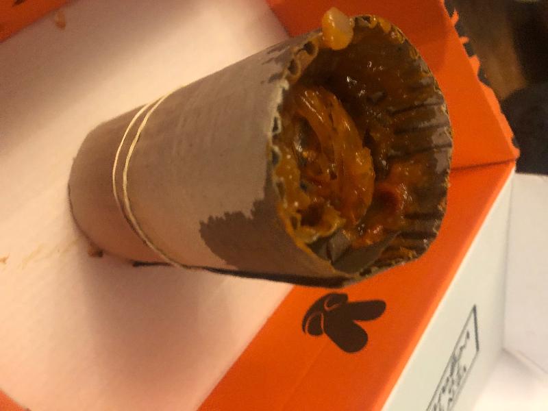 A jar of sauce had broken and the contents spilled in to the other items. T