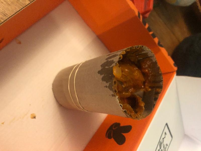 A jar of sauce had broken and the contents spilled in to the other items. T