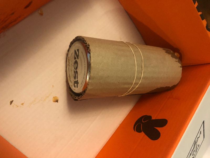 A jar of sauce had broken and the contents spilled in to the other items. T