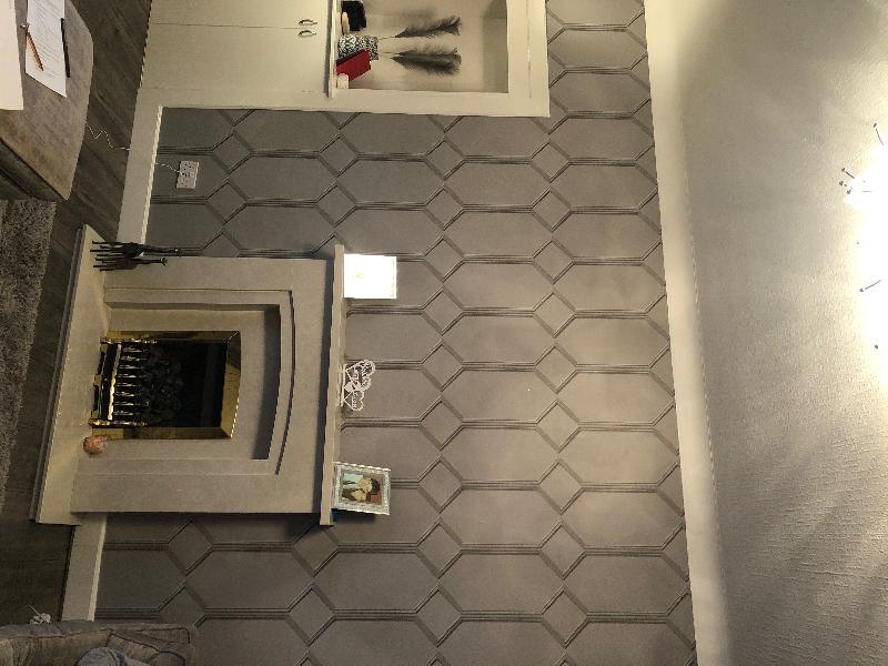 Wallpaper exactly as-in website, easy to put up, looks amazing in my lounge