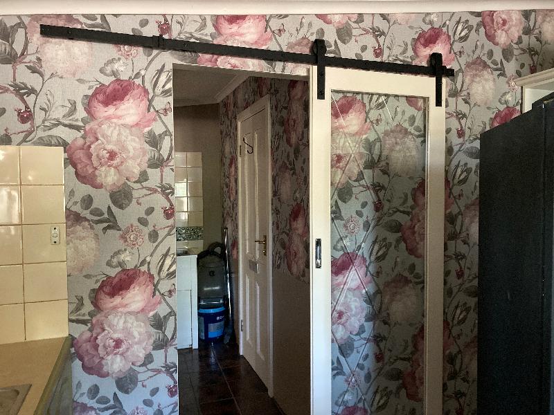 I love this wallpaper. It is definitely the hero of the room