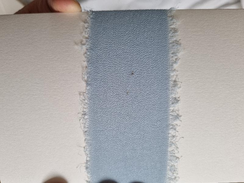 Poor quality ribbon / matrial. Disappointing