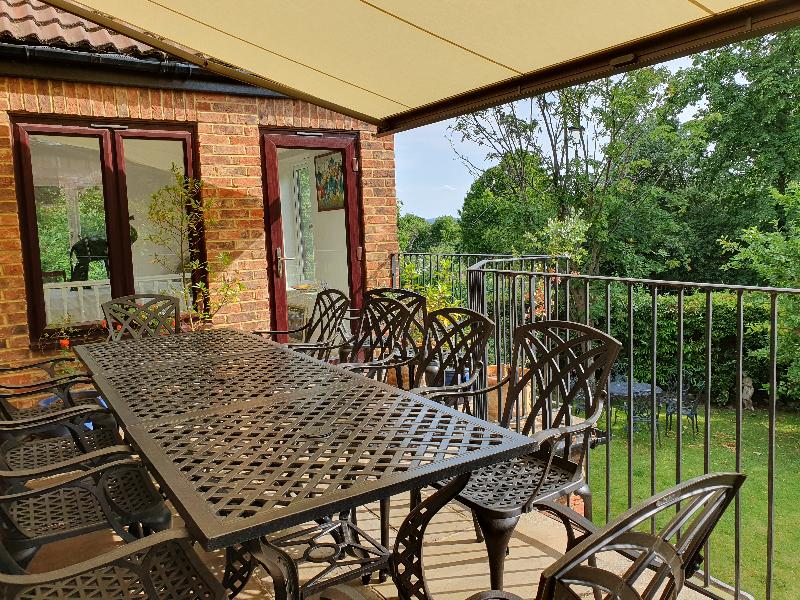 Delighted with awning which has enabled a lovely outdoors space