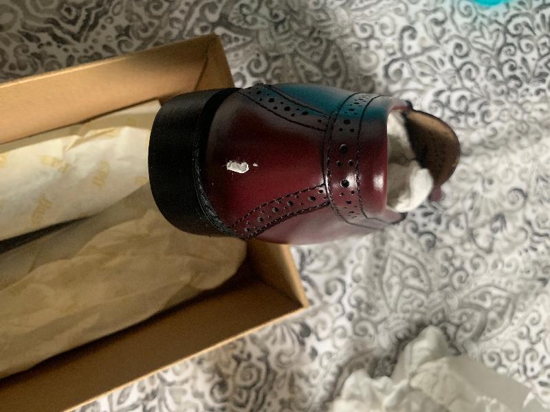 Shoes arrived with pieces of sticker on them