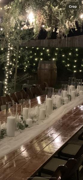 Glass storage jars used as candle holders
