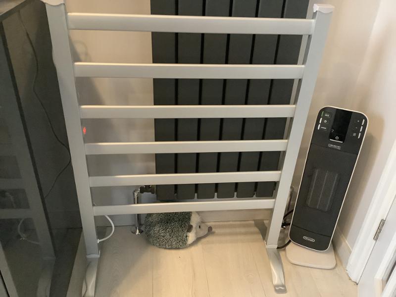 Wall and free standing electric radiator plug in.