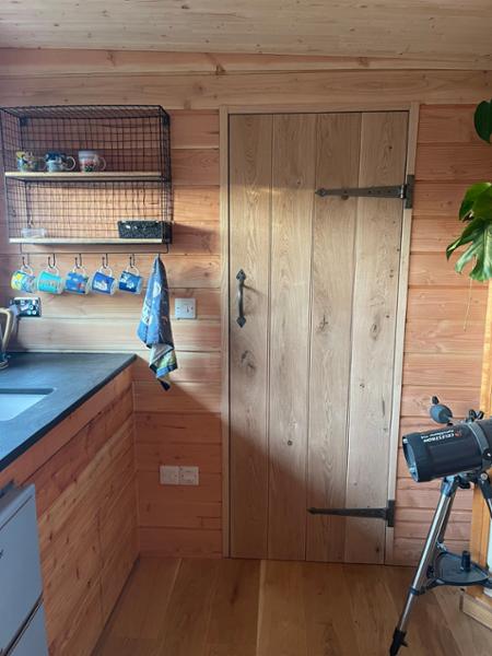 Kitchen shelves and hooks in metal and wood