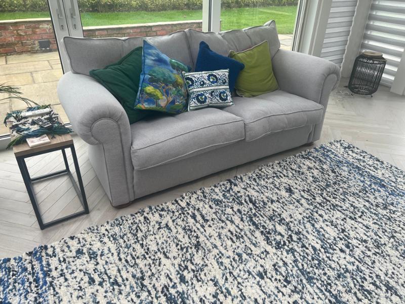 Cushions and rug for orangery. Looks great and makes the room vibrant with