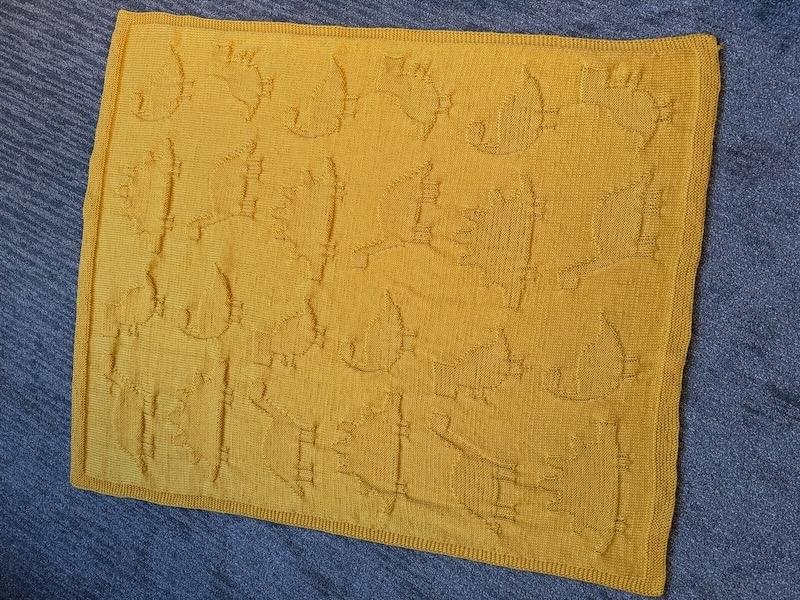 Knits easy, machine wash/dry baby blanket.