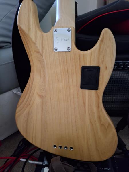Sire Marcus Miller V7 Reissue Left Handed Swamp Ash 4 String Bass in Natural Satin