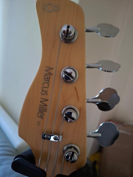 Sire Marcus Miller V7 Reissue Left Handed Swamp Ash 4 String Bass in Natural Satin