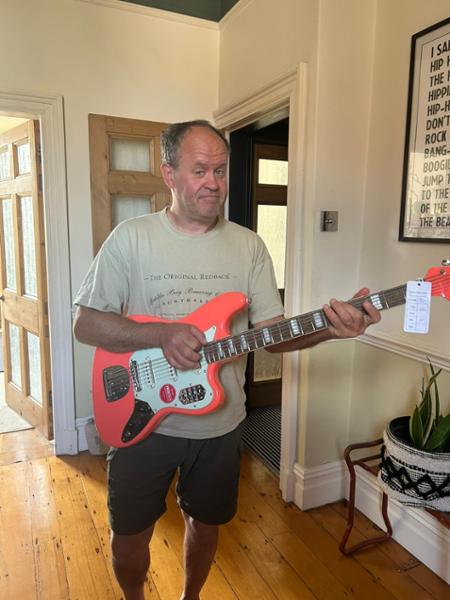 Squier Classic Vibe Bass VI in Tahitian Coral with Matching Headstock