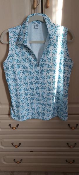 Amity Ladies Golf Sleeveless Polo Shirt - Floating Palms White