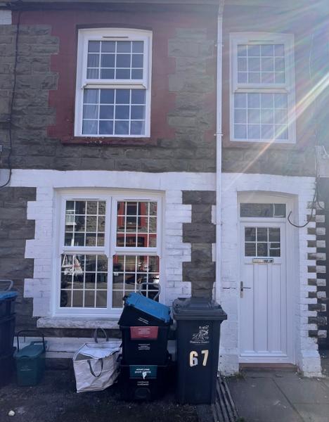 White A-rated windows with 18mm Georgian bar and run-through horns & white Vintage range uPVC front door