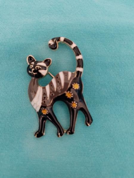 Superlative brooches