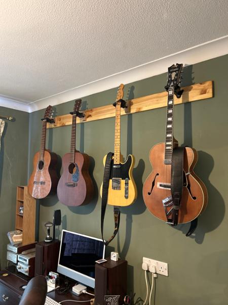 Hercules Guitar Hanger Upgraded Auto Grip System w/ Wood Block Wall Mount