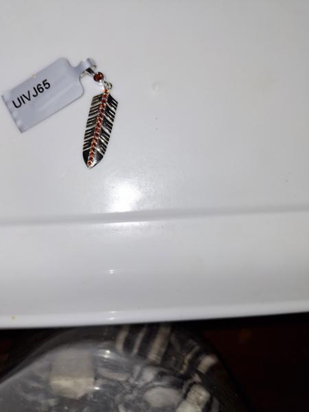 Jadeite and silver ant Hill feather