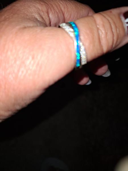 Eye catching blue opal twist ring