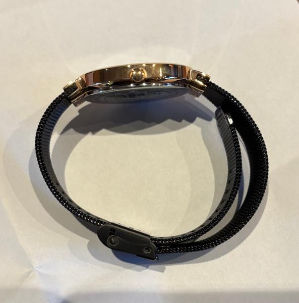 Quality watch but strap very long