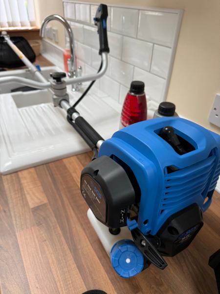 SGS petrol lawn mover and petrol strimmer