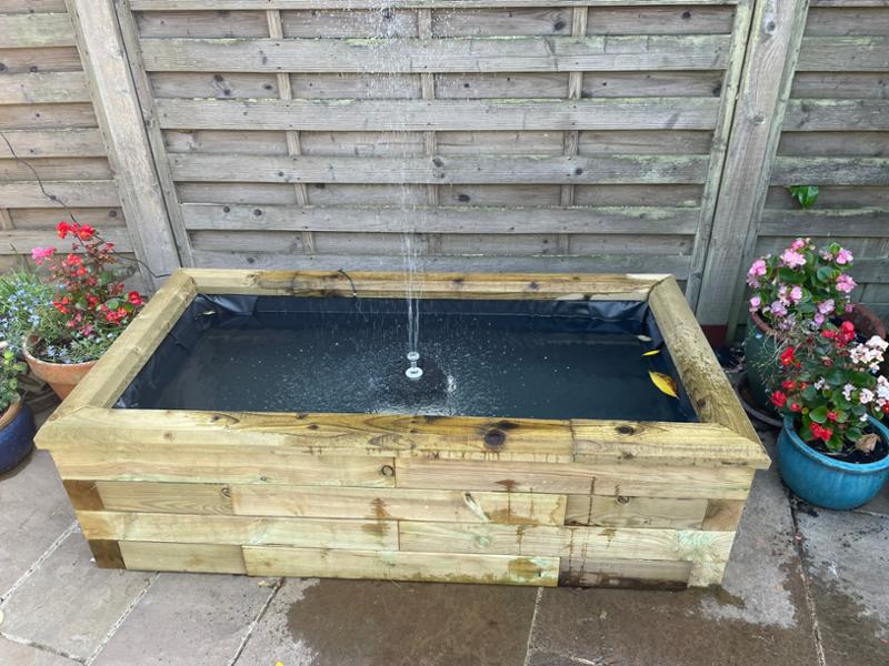Very happy with a small raised pond by WoodBlocX