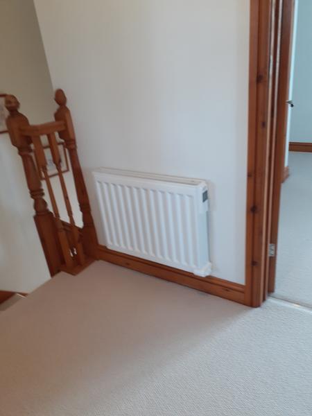 WALL FIXED RADIATOR THAT LOOKS LIKE A C. H. RAD