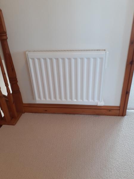 WALL FIXED RADIATOR THAT LOOKS LIKE A C. H. RAD
